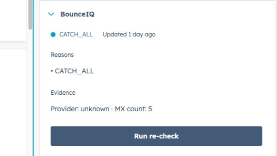 A HubSpot contact record with the BounceIQ CRM card expanded, showing status, reason, and last-checked timestamp.